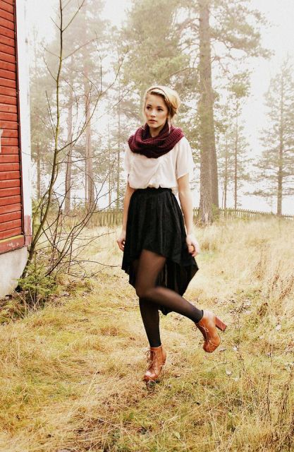 With white blouse, marsala scarf, black tights and brown leather boots