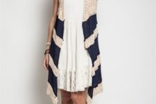 With white lace dress and beige sandals