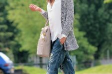With white shirt, gray cardigan, distressed jeans and tote