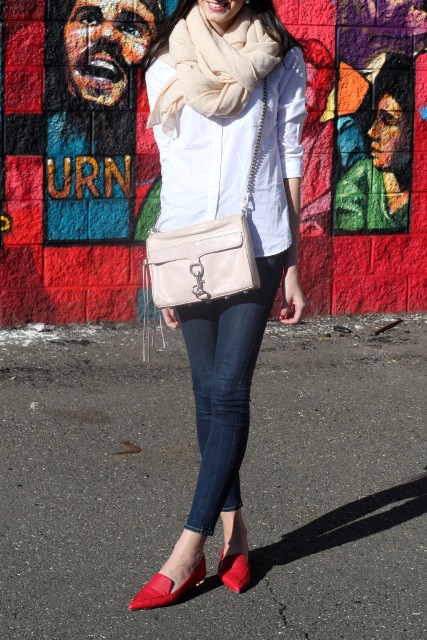 With white shirt, scarf, skinny jeans and pale pink bag