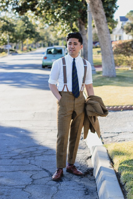 With white shirt, tweed pants, brown shoes and tie