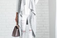 With white shirt, white distressed pants, gray pumps and small bag