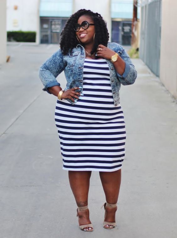 a striped knee dress, a denim jacket and nude shoes plus statement accessories