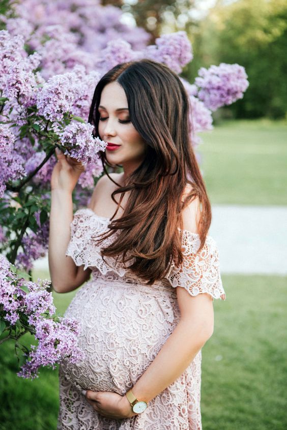 a blush lace off the shoulder maxi dress for a romantic and boho mom-to-be