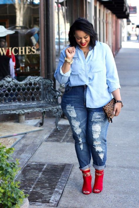 a chambray shirt, blue ripped jeans, bold red mules and a leopard print clutch