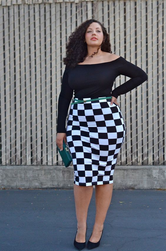 a black off the shoulder top, a checked pencil knee skirt, black shoes and a clutch