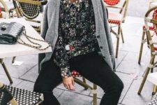 08 black boots, a floral shirt, black raw edge jeans and a grey cardigan