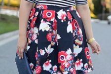 09 mixing prints right with a striped top, a floral full skirt, nude shoes and a navy clutch