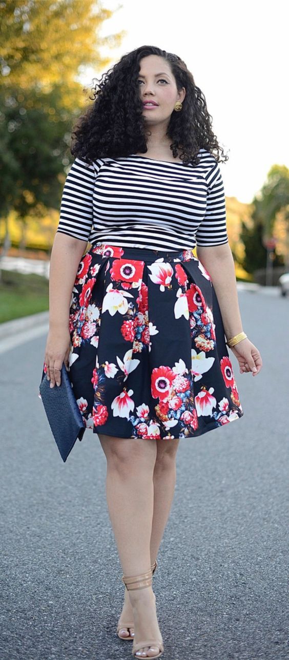 mixing prints right with a striped top, a floral full skirt, nude shoes and a navy clutch