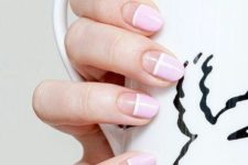 10 half negative space, half light pink nails with white stripes for a romantic person