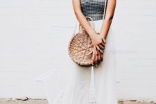 12 a gorgeous round straw bag combines two hot trends in one