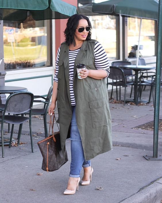 blue skinnies, a striped top, an army green long vest and blush shoes