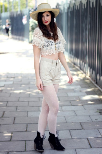 With beige shorts, white tights, black ankle boots and hat