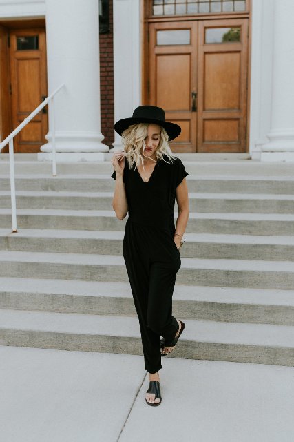 With black hat and black leather sandals