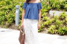 With blue off the shoulder shirt, white heels and tote