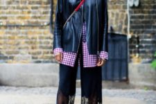 With checked shirt, black leather jacket, red bag and ankle boots