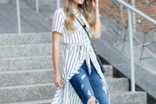 With distressed jeans, beige shoes and crossbody bag