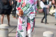 With floral sweatshirt, yellow shoes and mini clutch