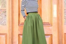 With green midi skirt and ankle boots