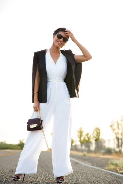With high heels, black blazer and chain strap bag