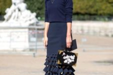 With navy blue shirt, bag and pumps