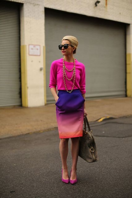 With pink shirt, pink pumps and gray tote