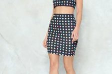 With polka dot skirt and white boots