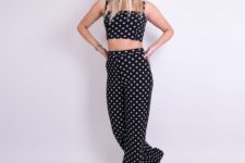 With polka dot wide leg pants and sneakers
