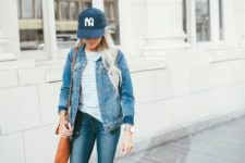 With shirt, distressed jeans, light blue sneakers, denim jacket and brown bag