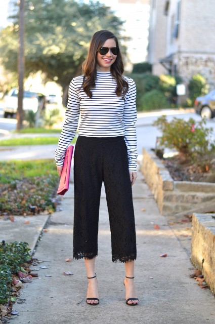 With striped shirt, heels and clutch