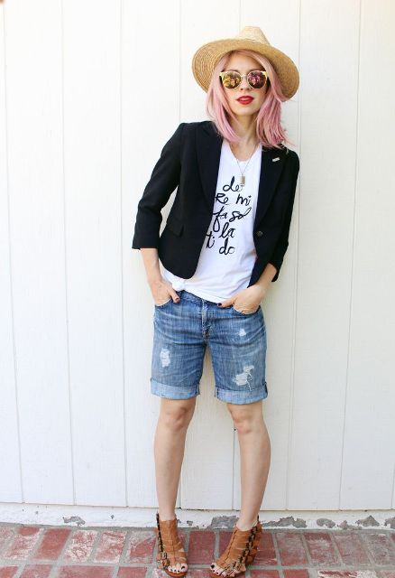 With t-shirt, black blazer, hat and brown sandals