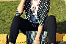 With t-shirt, black pants, yellow pumps and polka dot clutch