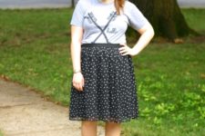 With t-shirt, polka dot skirt and blue shoes