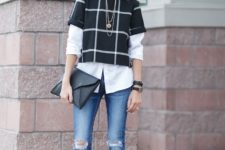 With white button down shirt, distressed jeans, white pumps and black clutch