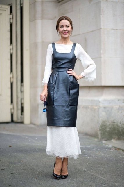 With white maxi dress and black pumps