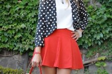 With white shirt, red mini skirt and red leather bag