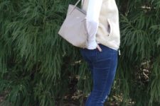 With white shirt, vest, jeans, ankle boots and gray tote