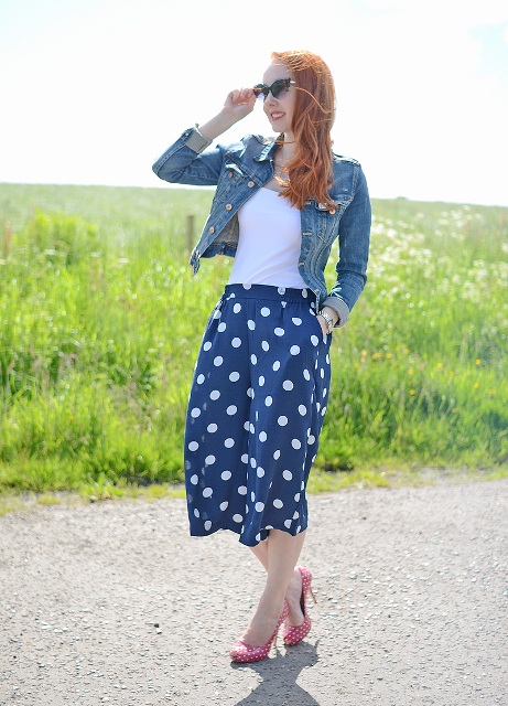 With white top, denim jacket and polka dot pumps