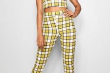 With yellow and white checked skinny pants and black high heels