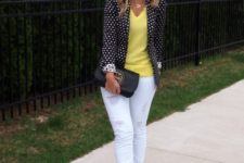 With yellow shirt, white cuffed pants, striped pumps and black clutch