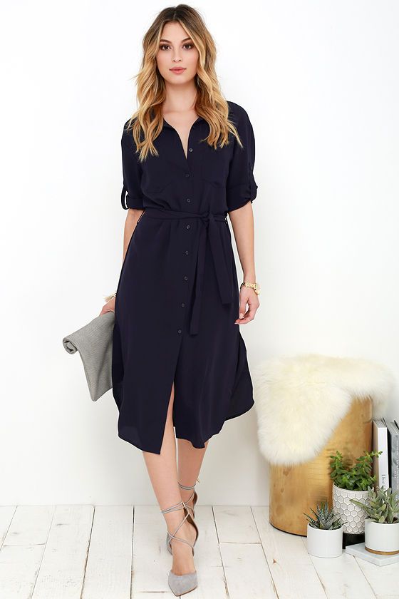 a navy midi shirtdress, grey suede lace up heels and a matching clutch for work