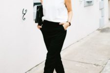 04 black pants, a sleeveless high neckline top, black lacquered leather shoes