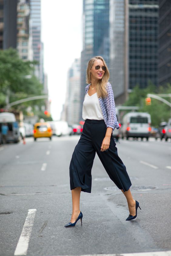 navy culottes, a white top, a blue printed shirt and blue shoes for comfort