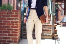10 ivory pants, a white tee, a navy jacket and black shoes for a smart casual work look