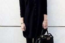 14 a black shirtdress worn over black skinnies, a black bag and flats to wear to work