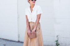 16 a white button down, a tan midi skirt, brown strappy heels and a brown clutch for a date