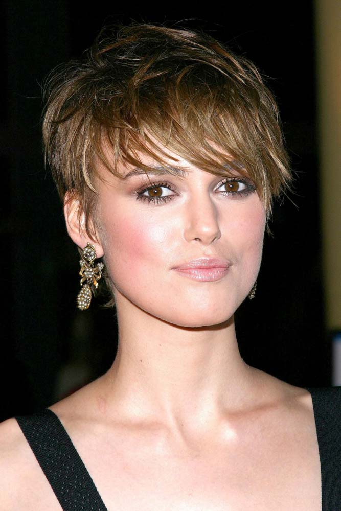 Keira Knightley wearing a choppy long pixie that looks bold, distinctive and face flattering and inspires