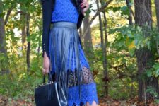 With blue lace midi dress, pumps and leather bag