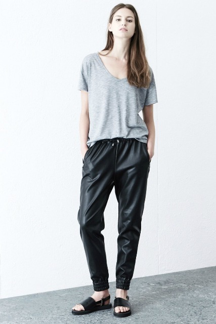With gray loose t-shirt and flat sandals