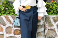 With navy blue wrap midi skirt, light gray shoes and blue bag